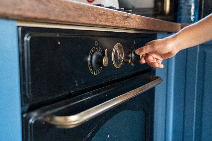 Vintage oven control knob used with safety precautions in a kitchen appliance in Keller, TX